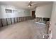 Open-concept living room with lots of natural light at 510 64Th Ave, St Pete Beach, FL 33706