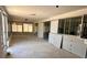 Bright sunroom featuring large windows offering plenty of natural light at 510 64Th Ave, St Pete Beach, FL 33706