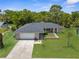 An aerial view showcasing the home's location, surroundings, and landscaping at 5193 Higate Rd, Spring Hill, FL 34609