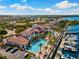 Aerial view of waterfront property with pool, marina, and beautiful landscaping at 5823 Bowen Daniel Dr # 906, Tampa, FL 33616