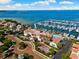Aerial view of luxurious waterfront homes, marina, and pristine landscaping at 5823 Bowen Daniel Dr # 906, Tampa, FL 33616