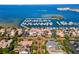 Stunning aerial view of the marina with numerous boats, showcasing the prime waterfront location at 5823 Bowen Daniel Dr # 906, Tampa, FL 33616