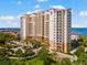 Beautiful condominium exterior, showcasing the coastal style architecture and water views at 5823 Bowen Daniel Dr # 906, Tampa, FL 33616