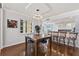 Modern dining space showcasing contemporary lighting and elegant decor with views of the city skyline at 5823 Bowen Daniel Dr # 906, Tampa, FL 33616