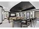 Home theater features a bar and seating with large screen for movie entertainment at 5823 Bowen Daniel Dr # 906, Tampa, FL 33616