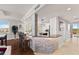Charming kitchen featuring a breakfast bar with stone accents, seamlessly connecting to the dining and living spaces at 5823 Bowen Daniel Dr # 906, Tampa, FL 33616