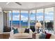 Bright and open living area with floor to ceiling windows providing water views at 5823 Bowen Daniel Dr # 906, Tampa, FL 33616