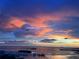 Panoramic water view at dusk showcasing vibrant colors and a serene environment at 5823 Bowen Daniel Dr # 906, Tampa, FL 33616
