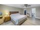 Spacious main bedroom features walk-in closet, ceiling fan, and ensuite bathroom at 592 Ken Hubbard Rd, Terra Ceia, FL 34250