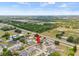 Drone shot displays community's picturesque setting near highway at 6507 61St E Dr, Palmetto, FL 34221
