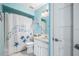 Clean bathroom featuring a shower/tub combo with patterned shower curtain and vanity at 6507 61St E Dr, Palmetto, FL 34221