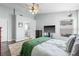 Inviting bedroom with wood floors, a ceiling fan, and natural light at 6507 61St E Dr, Palmetto, FL 34221