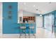 Open-concept kitchen featuring a bar with seating, and a spacious layout to dining area at 6507 61St E Dr, Palmetto, FL 34221