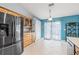Bright kitchen featuring stainless steel appliances and wood cabinetry at 6507 61St E Dr, Palmetto, FL 34221