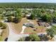 Large lot featuring a single-Gathering home with a sprawling lawn and mature trees, outlined in red at 7346 Hiawatha Pkwy, Spring Hill, FL 34606