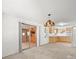 Open dining area leads to a kitchen and lanai through sliding glass doors at 7346 Hiawatha Pkwy, Spring Hill, FL 34606