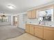 This charming eat-in kitchen offers lots of natural light with views to a living space at 7346 Hiawatha Pkwy, Spring Hill, FL 34606