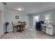 This bright dining room is adjacent to a desk area, perfect for a home office at 8358 Candlewood Rd, Seminole, FL 33777