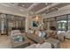 Elegant lounge area with modern decor, comfortable seating, and stylish lighting fixtures at 8474 Dunham Station Dr, Tampa, FL 33647
