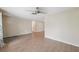 Spacious living room with hardwood floors and neutral paint at 8600 Village Mill Row, Hudson, FL 34667