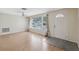 Bright living room with hardwood floors and large windows at 8600 Village Mill Row, Hudson, FL 34667