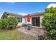 Patio with pavers, an outdoor table and an umbrella at 8600 Village Mill Row, Hudson, FL 34667