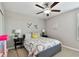 A colorful bedroom with a cute bed and side tables at 11504 Sage Canyon Dr, Riverview, FL 33578