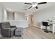 Cozy upstairs bedroom featuring an open area, enhanced by natural light and neutral tones at 11504 Sage Canyon Dr, Riverview, FL 33578