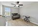 Neutral-toned Bedroom featuring a classic crib, changing table, and bright natural light at 11504 Sage Canyon Dr, Riverview, FL 33578