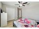 Bedroom featuring wood-look floors, closet and ceiling fan at 11504 Sage Canyon Dr, Riverview, FL 33578