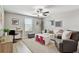 Upstairs living room featuring light, comfortable seating, playroom area, and natural light at 11504 Sage Canyon Dr, Riverview, FL 33578
