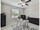 Office featuring a modern desk, chair, and a ceiling fan at 11504 Sage Canyon Dr, Riverview, FL 33578