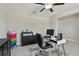 Office featuring a modern desk, chair, and a ceiling fan at 11504 Sage Canyon Dr, Riverview, FL 33578
