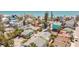 Aerial view of neighborhood with tropical landscaping and nearby beach at 121 86Th Ter, Treasure Island, FL 33706