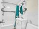 Bathroom with tub/shower combination, vanity, mirror, and toilet at 121 86Th Ter, Treasure Island, FL 33706