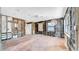 Large living room with tile flooring, updated lighting and natural light at 121 86Th Ter, Treasure Island, FL 33706