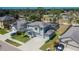 Two story home with a three car garage, lovely front porch and manicured landscaping at 12134 Creek Preserve Dr, Riverview, FL 33579