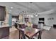 Bright open floor plan with kitchen island connecting living and dining areas at 12134 Creek Preserve Dr, Riverview, FL 33579