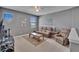 Cozy upstairs living room featuring a ceiling fan and comfortable seating and decor at 12134 Creek Preserve Dr, Riverview, FL 33579