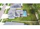 Aerial view of the home featuring a screened in pool and well maintained backyard at 12134 Creek Preserve Dr, Riverview, FL 33579