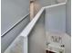 Carpeted staircase leads from the top floor to a lower level featuring neutral paint and modern decor at 12134 Creek Preserve Dr, Riverview, FL 33579