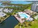 Wonderful aerial view of the community pool, water access, and Intracoastal Waterway views at 1328 Pasadena S Ave # 608, South Pasadena, FL 33707