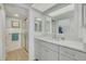Tastefully updated bathroom featuring modern vanity with beautiful countertops at 1328 Pasadena S Ave # 608, South Pasadena, FL 33707