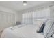 Bright bedroom with an abundance of natural light, closet and coastal-inspired decor at 1328 Pasadena S Ave # 608, South Pasadena, FL 33707