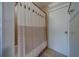 Bathroom showcasing a shower with decorative shower curtain and a neutral color palette at 135 Coral Dr, Safety Harbor, FL 34695