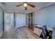 Comfortable bedroom features a ceiling fan and neutral walls at 135 Coral Dr, Safety Harbor, FL 34695