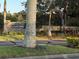 Stone entrance sign to Eastlake Oaks with landscaping at 1765 Oak Pond Ct, Oldsmar, FL 34677