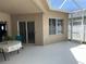 Enclosed patio with white flooring, sliding glass door, and bright natural light at 1765 Oak Pond Ct, Oldsmar, FL 34677