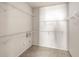 Walk-in closet featuring carpeted floors and wire shelving along three walls at 18017 Villa Creek Dr # 18017, Tampa, FL 33647