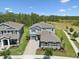 Aerial view of the home showcasing the property's layout and proximity to neighbors at 18219 Ramble On Way, Land O Lakes, FL 34638